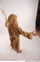 JOEL_ADAMSON STANDING POSE WITH A MAGIC STICK